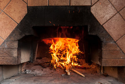 Bonfire on wooden wall