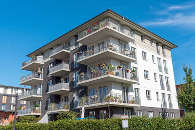 New grey multi-family house seen in berlin, germany