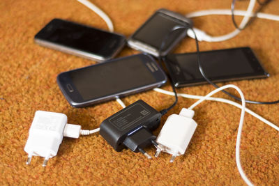 High angle view of smart phone on table