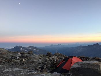 Scenic view of mountains against sky during sunset