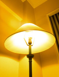 Low angle view of illuminated light bulb