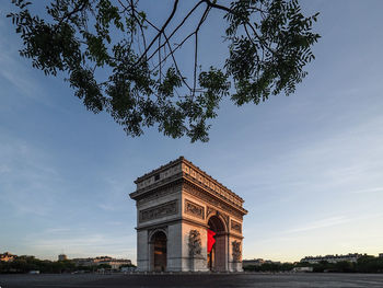 Empty arc de triomphe, paris, france, early morning with sunrise