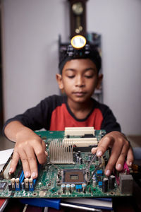 Portrait of happy boy playing