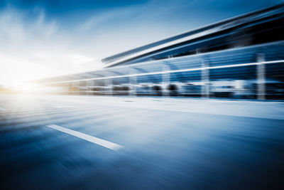 Blurred motion of train against blue sky