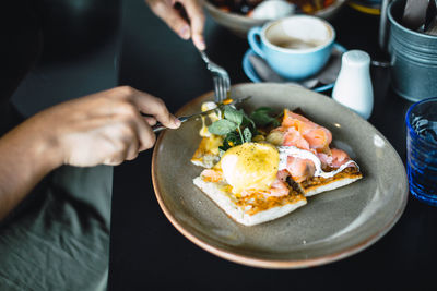 Close-up of man having breakfast