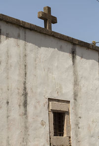 Low angle view of old building against sky