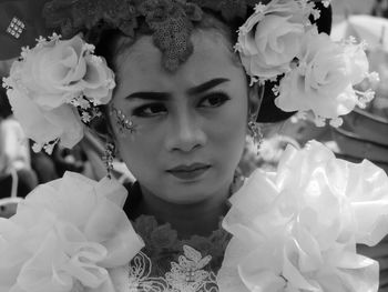 Portrait of woman with bouquet