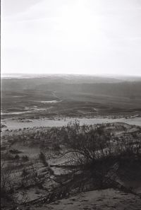 Scenic view of land against clear sky