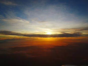 Scenic view of dramatic sky during sunset