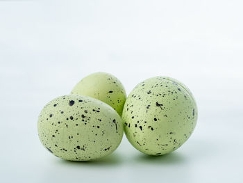 Close-up of egg against white background