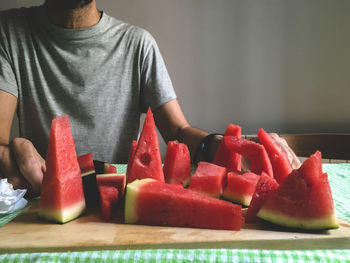 Close-up of man holding fruits