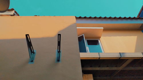 High angle view of swimming pool by building