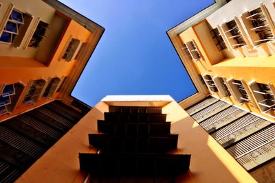 Low angle view of buildings against clear sky