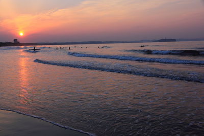 View of calm sea at sunset