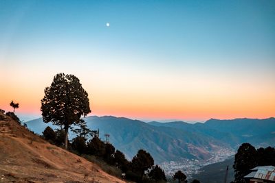 Scenic view of mountains against sky during sunset