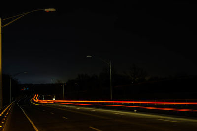 Light trails on road at night