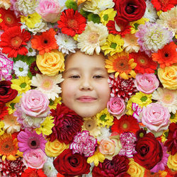Portrait of girl with pink flower bouquet