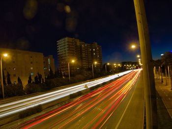 Light trails on road at night