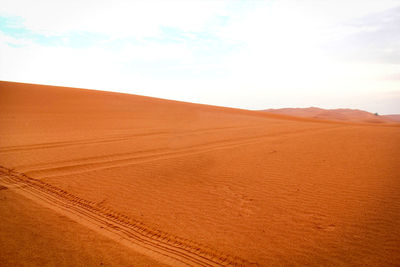 Scenic view of desert against sky