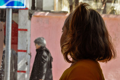 Rear view of women in city