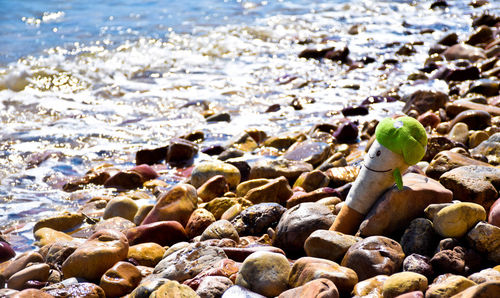 Close-up of pebbles on beach