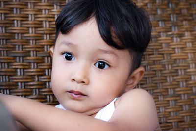 Close-up of cute boy at home