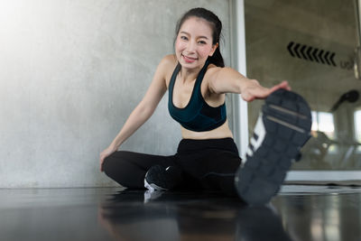 Portrait of young woman smiling