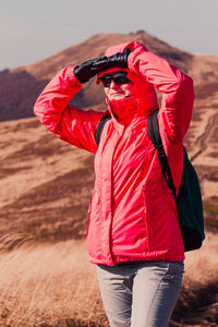 Woman standing on mountain