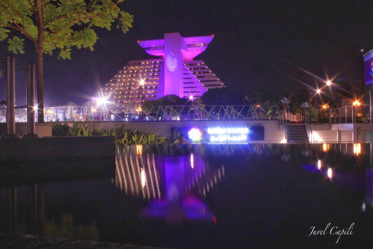 night, illuminated, water, reflection, architecture, tree, built structure, outdoors, no people, building exterior, nature, sky