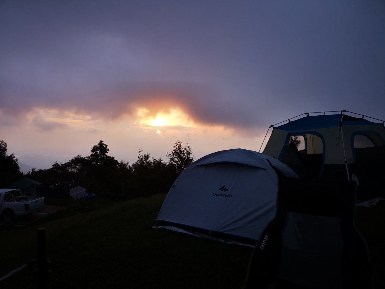 VIEW OF TENT AGAINST CLOUDY SKY