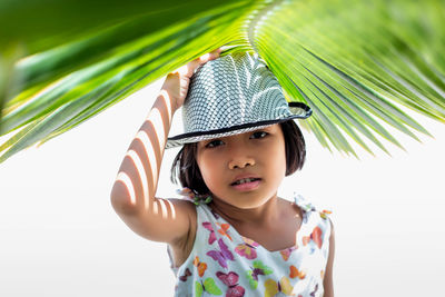 Portrait of cute girl wearing hat