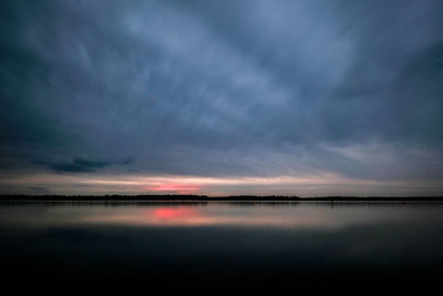 Scenic view of sea against dramatic sky