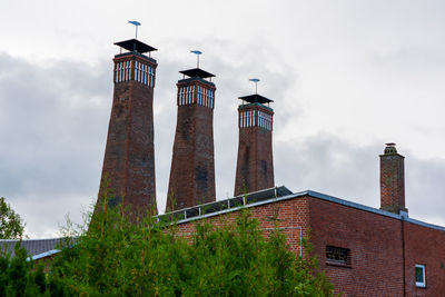 Factory roof with four chimneys, germany.