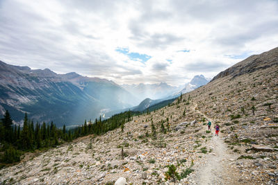 Sun rays peaking through the clouds while hiking the iceline trail