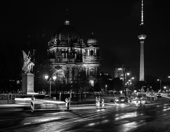 Illuminated buildings in city at night