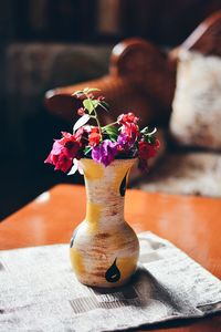 Close-up of vase on table at home