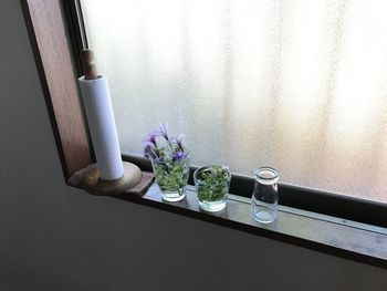 High angle view of flower vase on window sill