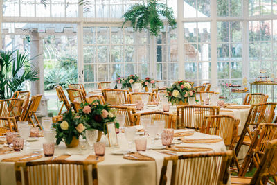 Potted plants on table in restaurant