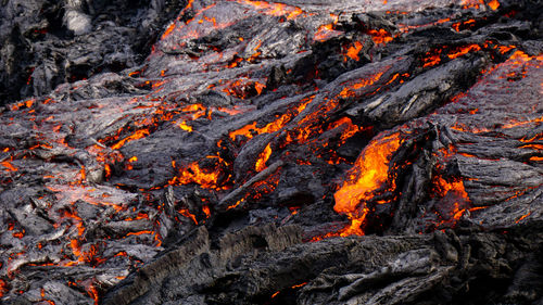 Smoke emitting from volcanic mountain at night