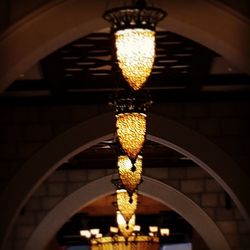 Low angle view of illuminated ceiling