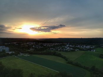 Scenic view of landscape against sky during sunset