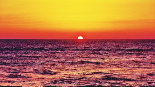 Scenic view of sunset over sea