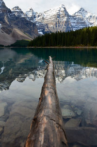 Scenic view of lake and mountains during winter