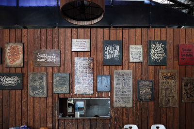 Text on wooden wall of building