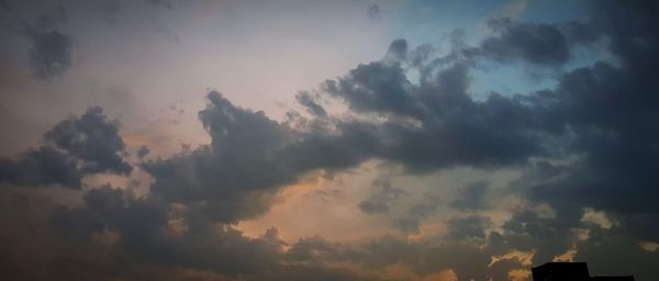 Low angle view of clouds in sky during sunset