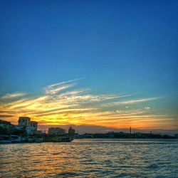 Scenic view of sea at sunset