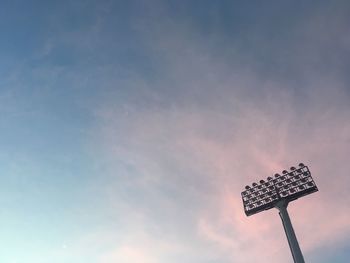 Low angle view of building against cloudy sky