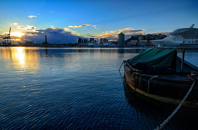 Boats moored at harbor