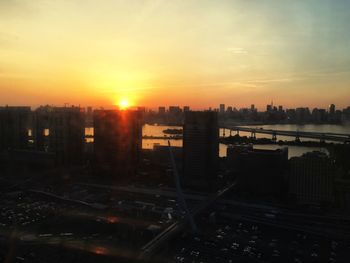 View of cityscape at sunset