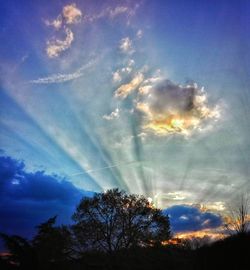 Low angle view of vapor trails in sky